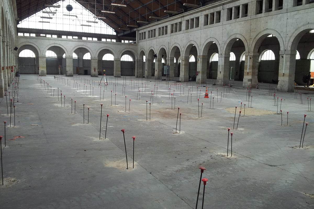 Stabilisation de dalles dans une halle de marché couvert 