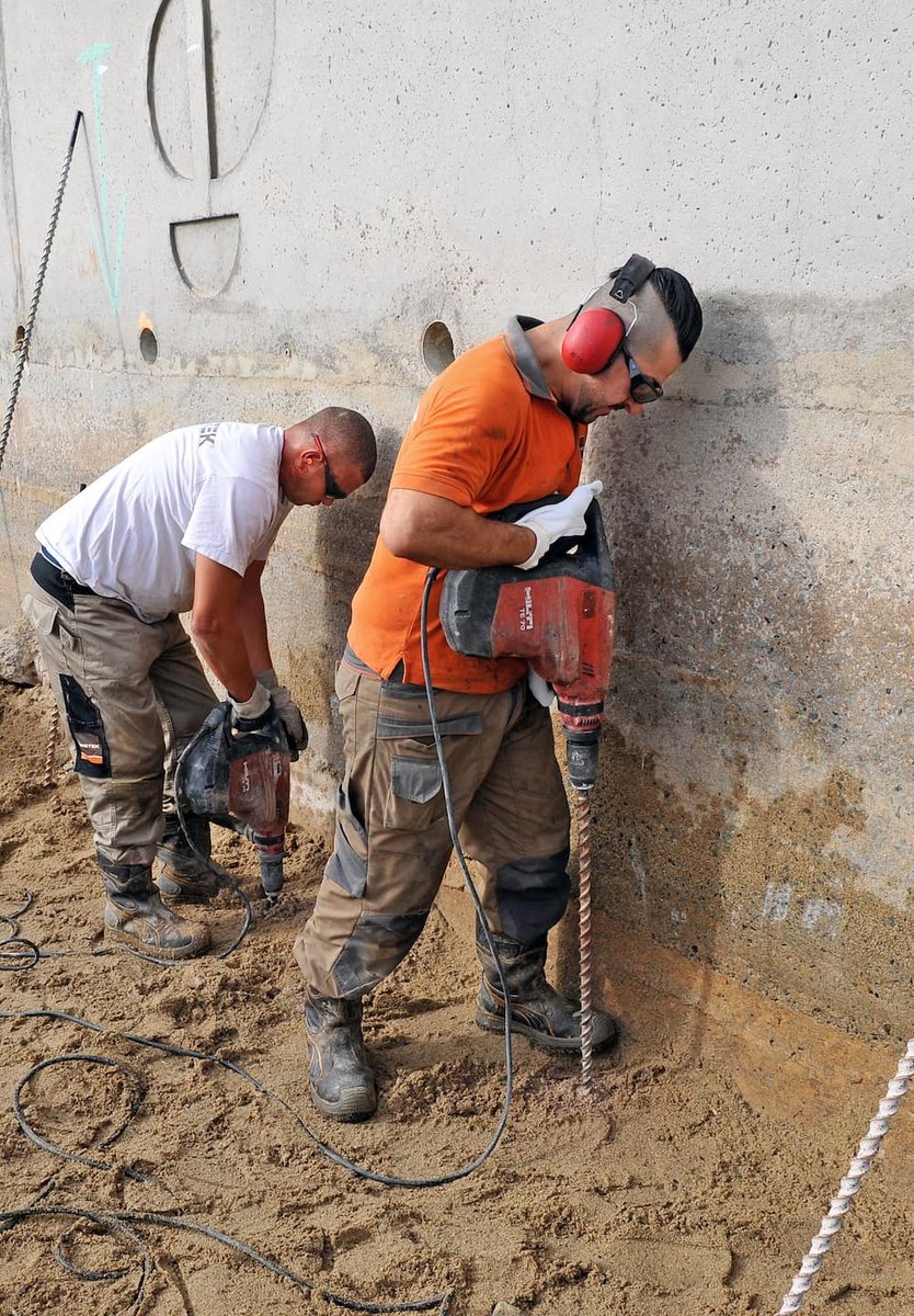 Percement sous un mur de soutènement par URETEK